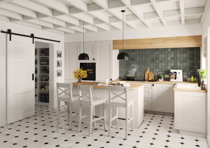 Cocina blanca madera con isla central, taburetes blancos, lámparas colgantes